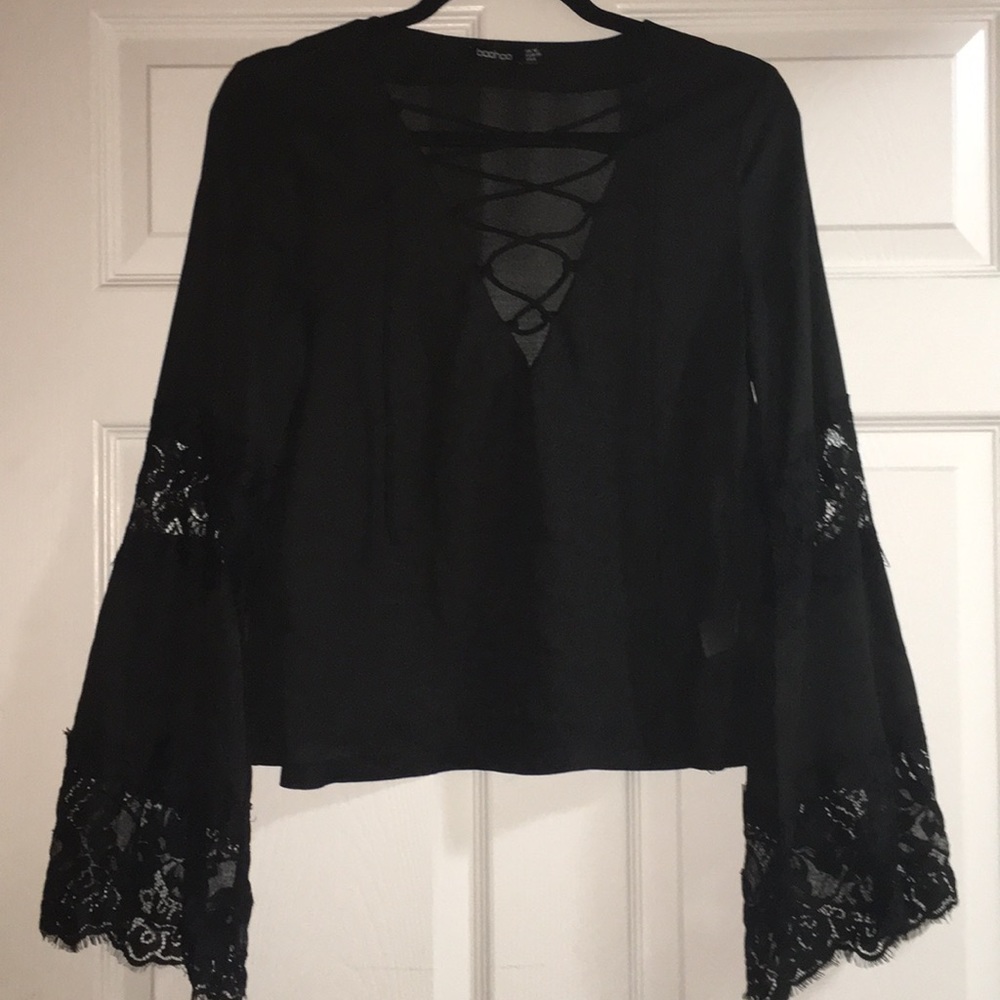 Bell sleeve lace up top